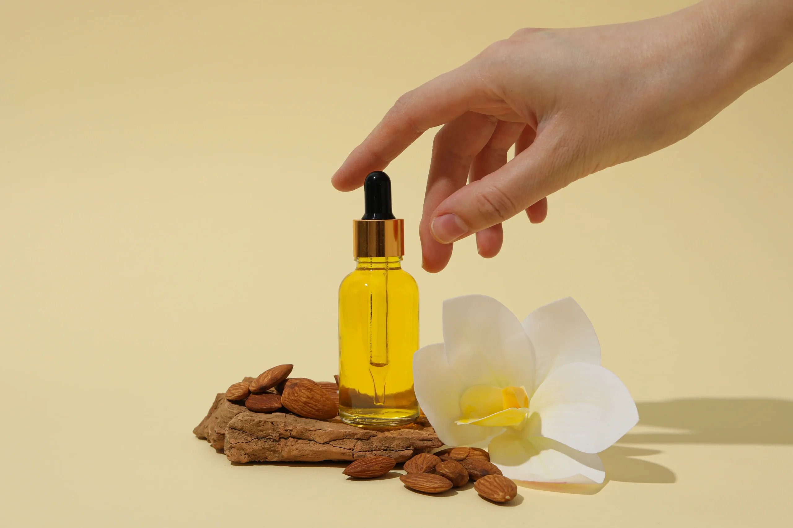 skin-care-body-care-concept-almonds-almond-oil-scaled-1.webp Earth’s Goddess Yoni Feminine Wellness Oil - Image 1